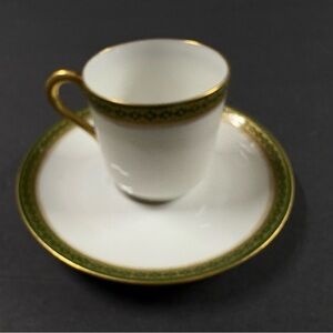 Elegant White and Gold Teacup with Saucer